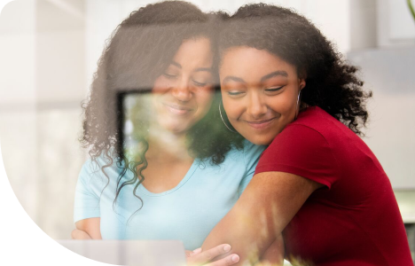 Two women embracing